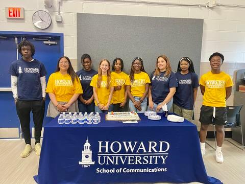 Students in the 2024 cohort pose for a photo after their graduation from the program